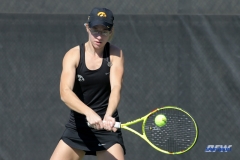 DALLAS, TX - FEBRUARY 4: Iowa player hits a backhand during the SMU women's tennis match vs Iowa on February 4, 2018, at the SMU Tennis Complex, Turpin Stadium & Brookshire Family Pavilion in Dallas, TX. (Photo by George Walker/DFWsportsonline)