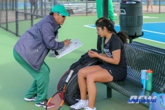Denton, TX - February 25: Volunteer Coach Raj Lama during the UNT Mean Green Women’s Tennis dual match against the Marshall Thundering Herd at the Waranch Tennis Complex in Denton, TX. (Photo by Mark Woods/DFWsportsonline)