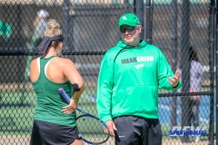 Denton, TX - March 3: Associate Head Coach Jeff Hammond discusses strategy with Alexandra Héczey during the UNT Mean Green Women’s Tennis dual match against the University of Houston at the Waranch Tennis Complex in Denton, TX. (Photo by Mark Woods/DFWsportsonline)