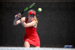 DALLAS, TX - MARCH 16: Nicole Petchey hits a backhand during the SMU women's tennis match vs Troy on March 16, 2018, at the SMU Tennis Complex, Turpin Stadium & Brookshire Family Pavilion in Dallas, TX. (Photo by George Walker/DFWsportsonline)