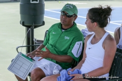 Head Coach Sujay Lama and Tamuna Kutubidze discuss strategy during a court change during the KU match on March 19, 2017 at Waranch Tennis Center.