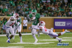 DENTON, TX - SEPTEMBER 01: UNT running back Nic Smith (21) advances the ball during the game between North Texas and SMU on September 1, 2018 at Apogee Stadium in Denton, TX. (Photo by Mark Woods/DFWsportsonline)