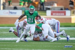 DENTON, TX - SEPTEMBER 01: North Texas Mean Green running back Nic Smith (21) runs up the middle during the game between North Texas and SMU on September 1, 2018 at Apogee Stadium in Denton, TX. (Photo by George Walker/Icon Sportswire)