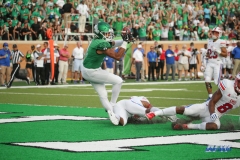 DENTON, TX - SEPTEMBER 01: North Texas Mean Green wide receiver Jalen Guyton (9) catches a touchdown pass during the game between North Texas and SMU on September 1, 2018 at Apogee Stadium in Denton, TX. (Photo by George Walker/Icon Sportswire)
