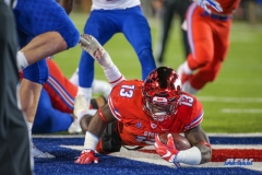 DALLAS, TX - OCTOBER 27: Southern Methodist Mustangs running back Ke'Mon Freeman (13) dives into the end zone for a touchdown during the game between SMU and Tulsa on October 27, 2017, at Gerald J. Ford Stadium in Dallas, TX. (Photo by George Walker/DFWsportsonline)