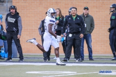 DENTON, TX - OCTOBER 28: Old Dominion Monarchs wide receiver Isaiah Harper (15) returns a kick for a touchdown during the game between the North Texas Mean Green and Old Dominion Monarchs on October 28, 2017, at Apogee Stadium in Denton, Texas. (Photo by George Walker/DFWsportsonline)