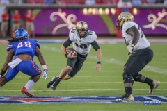 DALLAS, TX - NOVEMBER 04: UCF Knights quarterback McKenzie Milton (10) runs for a first down during the game between SMU and UCF on November 4, 2017, at Gerald J. Ford Stadium in Dallas, TX. (Photo by George Walker/Icon Sportswire)