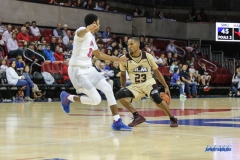 DALLAS, TX - NOVEMBER 12: Louisiana Monroe Warhawks guard Jordon Harris (23) dribbles behind his back during the game between SMU and ULM on November 12, 2017 at Moody Coliseum in Dallas, TX. (Photo by George Walker/Icon Sportswire)