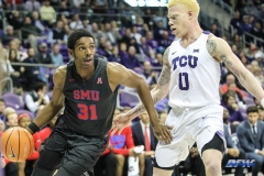 FORT WORTH, TX - DECEMBER 05: Southern Methodist Mustangs guard Jimmy Whitt (31) drives to the basket during the game between SMU and TCU on December 5, 2017 at the Ed and Rae Schollmaier Arena in Fort Worth, TX. (Photo by George Walker/DFWsportsonline