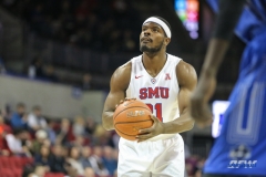 DALLAS, TX - DECEMBER 13: Southern Methodist Mustangs guard Ben Emelogu II (21) shoots a free throw during the men's basketball game between SMU and New Orleans on December 13, 2017, at Moody Coliseum, in Dallas, TX. (Photo by George Walker/DFWsportsonline)