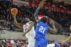 UNIVERSITY PARK, TX - DECEMBER 13: Southern Methodist Mustangs guard Ben Emelogu II (21) goes to the basket during the game between SMU and New Orleans on December 13, 2017 at Moody Coliseum in Dallas, TX. (Photo by George Walker/Icon Sportswire)