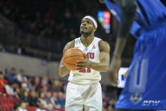 UNIVERSITY PARK, TX - DECEMBER 13: Southern Methodist Mustangs guard Ben Emelogu II (21) shoots a free throw during the game between SMU and New Orleans on December 13, 2017 at Moody Coliseum in Dallas, TX. (Photo by George Walker/Icon Sportswire)