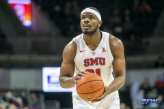 UNIVERSITY PARK, TX - DECEMBER 19: Southern Methodist Mustangs guard Ben Emelogu II (21) prepares to shoot a free throw during the game between SMU and Cal Poly State on December 19, 2017, at Moody Coliseum in Dallas, TX. (Photo by George Walker/DFWsportsonline)