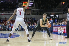 UNIVERSITY PARK, TX - DECEMBER 19: Cal Poly Mustangs guard Trevor John (2) looks to pass the ball during the game between SMU and Cal Poly on December 19, 2017, at Moody Coliseum in Dallas, TX. (Photo by George Walker/Icon Sportswire)