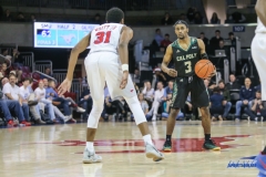 UNIVERSITY PARK, TX - DECEMBER 19: Cal Poly Mustangs guard Donovan Fields (3) sets the play during the game between SMU and Cal Poly on December 19, 2017, at Moody Coliseum in Dallas, TX. (Photo by George Walker/Icon Sportswire)