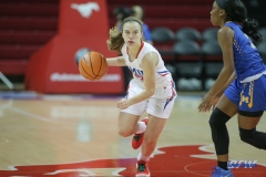 UNIVERSITY PARK, TX - DECEMBER 22: Southern Methodist Mustangs guard Morgan Smith (12) brings the ball up court during the women's game between SMU and McNeese State on December 22, 2017, at Moody Coliseum in Dallas, TX. (Photo by George Walker/Icon Sportswire)