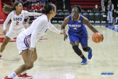 UNIVERSITY PARK, TX - DECEMBER 22: McNeese State Cowgirls guard Dede Sheppard (4) drives to the basket during the women's game between SMU and McNeese State on December 22, 2017, at Moody Coliseum in Dallas, TX. (Photo by George Walker/Icon Sportswire)