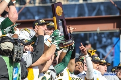 FRISCO, TX - JANUARY 6: North Dakota State players lift the trophy after winning the NCAA FCS Championship football game between North Dakota State and James Madison on January 6, 2018 at Toyota Stadium in Frisco, TX. (Photo by George Walker/DFWsportsonline)