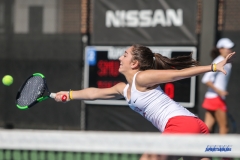 DALLAS, TX - FEBRUARY 4: Charline Anselmo hits a forehand volley during the SMU women's tennis match vs Iowa on February 4, 2018, at the SMU Tennis Complex, Turpin Stadium & Brookshire Family Pavilion in Dallas, TX. (Photo by George Walker/DFWsportsonline)
