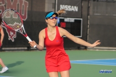 DALLAS, TX - FEBRUARY 09: Karina Traxler hits a forehand during the SMU women's tennis match vs UCF on February 9, 2018, at the SMU Tennis Complex, Turpin Stadium & Brookshire Family Pavilion in Dallas, TX. (Photo by George Walker/DFWsportsonline)