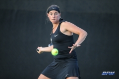 DALLAS, TX - FEBRUARY 09: UCF player hits a forehand during the SMU women's tennis match vs UCF on February 9, 2018, at the SMU Tennis Complex, Turpin Stadium & Brookshire Family Pavilion in Dallas, TX. (Photo by George Walker/DFWsportsonline)