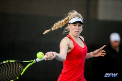 DALLAS, TX - FEBRUARY 09: Nicole Petchey hits a forehand during the SMU women's tennis match vs UCF on February 9, 2018, at the SMU Tennis Complex, Turpin Stadium & Brookshire Family Pavilion in Dallas, TX. (Photo by George Walker/DFWsportsonline)