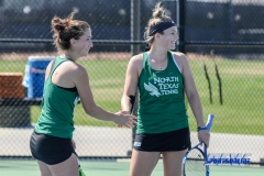 Denton, TX - March 3: Tamuna Kutubidze and Alexandra Héczey during the UNT Mean Green Women’s Tennis dual match against the University of Houston at the Waranch Tennis Complex in Denton, TX. (Photo by Mark Woods/DFWsportsonline)
