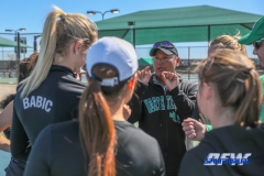Denton, TX - March 7: Head Coach Sujay Lama shares last minute advice to the team at the UNT Mean Green Women’s Tennis dual match against the Middle Tennessee State University at the Warch Tennis Complex in Denton, TX. (Photo by Mark Woods/DFWsportsonanline)