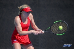 DALLAS, TX - MARCH 16: Nicole Petchey hits a backhand during the SMU women's tennis match vs Troy on March 16, 2018, at the SMU Tennis Complex, Turpin Stadium & Brookshire Family Pavilion in Dallas, TX. (Photo by George Walker/DFWsportsonline)