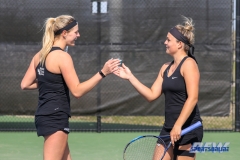 Denton, TX - March 17: Ivana Babić and Alexandra Héczey during the UNT Mean Green Women’s Tennis dual match against Troy University at the Waranch Tennis Complex in Denton, TX. (Photo by Mark Woods/DFWsportsonline)