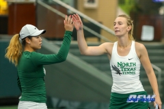 Plano, TX - April 14: Maria Kononova and Minying Liang during the North Texas Women’s Tennis dual match against the University of Arlington at the Lifetime Plano Tennis facility in Plano, TX. (Photo by Mark Woods/DFWsportsonline)