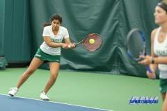 Plano, TX - April 14: Nidhi Surapaneni returing serve during the North Texas Women’s Tennis dual match against the University of Arlington at the Lifetime Plano Tennis facility in Plano, TX. (Photo by Mark Woods/DFWsportsonline)
