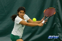 Plano, TX - April 14: Nidhi Surapaneni hits a backhand during the North Texas Women’s Tennis dual match against the University of Arlington at the Lifetime Plano Tennis facility in Plano, TX. (Photo by Mark Woods/DFWsportsonline)