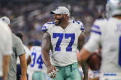 ARLINGTON, TX - AUGUST 18: Dallas Cowboys offensive tackle Tyron Smith (77) laughs on the sideline during the preseason game between the Dallas Cowboys and Cincinnati Bengals on August 18, 2018 at AT&T Stadium in Arlington, TX. (Photo by George Walker/Icon Sportswire)