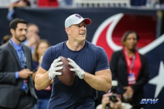 HOUSTON, TX - AUGUST 30: Houston Texans defensive end J.J. Watt (99) passes the football with fans before the preseason game between the Houston Texans and Dallas Cowboys on August 30, 2018, at NRG Stadium in Houston, TX. (Photo by George Walker/DFWsportsonline)