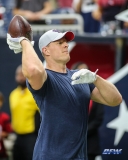 HOUSTON, TX - AUGUST 30: Houston Texans defensive end J.J. Watt (99) passes the football with fans before the preseason game between the Houston Texans and Dallas Cowboys on August 30, 2018, at NRG Stadium in Houston, TX. (Photo by George Walker/DFWsportsonline)