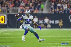 HOUSTON, TX - AUGUST 30: Dallas Cowboys running back Bo Scarbrough (36) bobbles the ball during the preseason game between the Houston Texans and Dallas Cowboys on August 30, 2018, at NRG Stadium in Houston, TX. (Photo by George Walker/DFWsportsonline)