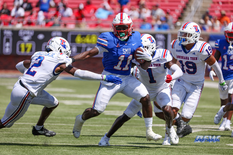 DALLAS, TX - SEPTEMBER 02: Southern Methodist Mustangs running back LJ Johnson Jr. (11) breaks a tackle during the game between SMU and Louisiana Tech on September 2, 2023 at Gerald J Ford Stadium in Dallas, TX. (Photo by George Walker/Icon Sportswire)