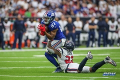 HOUSTON, TX - SEPTEMBER 23: New York Giants wide receiver Sterling Shepard (87) is tackled by Houston Texans defensive back Aaron Colvin (22) during the game between the Houston Texans and New York Giants on September 23, 2018, at NRG Stadium in Houston, TX. (Photo by George Walker/DFWsportsonline)