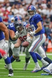 HOUSTON, TX - SEPTEMBER 23: Houston Texans defensive end J.J. Watt (99) forces a fumble by New York Giants quarterback Eli Manning (10) during the game between the Houston Texans and New York Giants on September 23, 2018, at NRG Stadium in Houston, TX. (Photo by George Walker/DFWsportsonline)