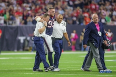 HOUSTON, TX - OCTOBER 08: Houston Texans defensive end J.J. Watt (99) is helped off the field during the game between the Houston Texans and Kansas City Chiefs on October 8, 2017, at NRG Stadium in Houston, TX. (Photo by George Walker/DFWsportsonline)