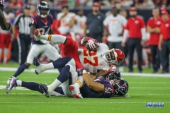 HOUSTON, TX - OCTOBER 08: Kansas City Chiefs running back Kareem Hunt (27) is upended during the game between the Houston Texans and Kansas City Chiefs on October 8, 2017, at NRG Stadium in Houston, TX. (Photo by George Walker/DFWsportsonline)