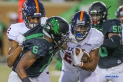 DENTON, TX - OCTOBER 14: North Texas Mean Green safety Kishawn McClain (6) tackles UTSA Roadrunners running back Tyrell Clay (22) during the game between the North Texas Mean Green and UTSA Roadrunners on October 14, 2017, at Apogee Stadium in Denton, Texas. (Photo by George Walker/DFWsportsonline)