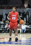 UNIVERSITY PARK, TX - NOVEMBER 10: Southern Methodist Mustangs guard Elijah Landrum (20) brings the ball up court during the men's basketball game between SMU and UMBC on November 10, 2017, at Moody Coliseum in Dallas, TX.(Photo by George Walker/Icon Sportswire)