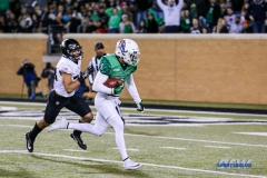 Denton, TX - November 18: North Texas wide receiver Turner Smiley (1) advancing the ball for a touchdown during the game between the North Texas Mean Green and Army West Point Black Knights (Photo by Mark Woods/DFWsportsonline)