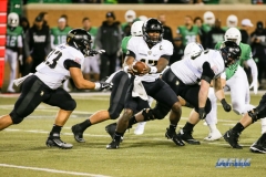 Denton, TX - November 18: Army quarterback Ahmad Bradshaw (17) hands off to running back Darnell Woolfolk (33) during the game between the North Texas Mean Green and Army West Point Black Knights (Photo by Mark Woods/DFWsportsonline)