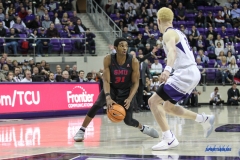 FORT WORTH, TX - DECEMBER 05: Southern Methodist Mustangs guard Jimmy Whitt (31) is guarded by TCU Horned Frogs guard Jaylen Fisher (0) during the game between SMU and TCU on December 5, 2017 at the Ed and Rae Schollmaier Arena in Fort Worth, TX. (Photo by George Walker/DFWsportsonline