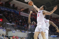 UNIVERSITY PARK, TX - DECEMBER 18: Southern Methodist Mustangs forward Ethan Chargois (5) blocks a shot during the game between SMU and Boise State on December 18, 2017, at Moody Coliseum in Dallas, TX. (Photo by George Walker/DFWsportsonline)