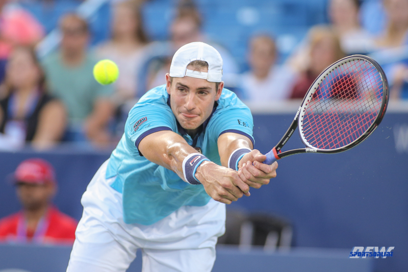 CINCINNATI, OH - John Isner (USA) stretches for a backhand during the Western & Southern Open at the Lindner Family Tennis Center in Mason, Ohio on August 13, 2017, (Photo by George Walker/DFWsportsonline