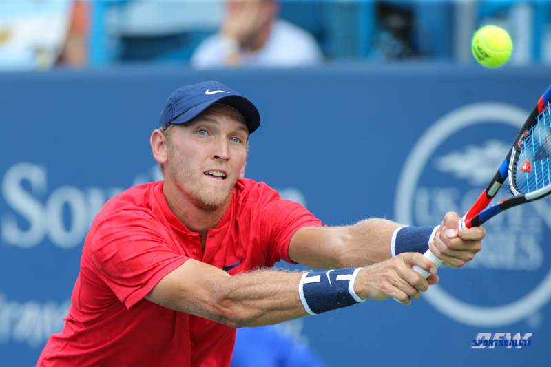 CINCINNATI, OH - AUGUST 16: Mitchell Krueger (USA) stretches for a backhand during the Western & Southern Open at the Lindner Family Tennis Center in Mason, Ohio on August 16, 2017.(Photo by George Walker/Icon Sportswire)